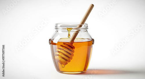 honey dripping from a glass jar