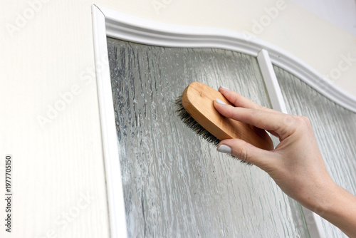 Woman washing windows. House cleaning.