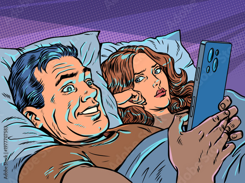 Pop Art Retro A man in bed with his wife looking at his phone. Relationship problems in a married couple. Infidelity and partner addiction.