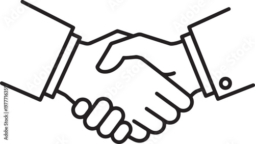 Two business people shaking hands in agreement and partnership