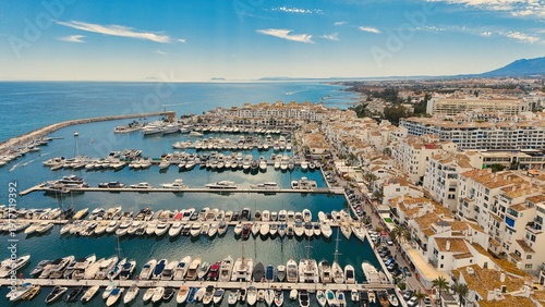 Puerto Banús marina aerial view with luxury yachts and waterfront, Marbella, Costa del Sol, Spain
