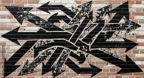 Black Graffiti Arrows Spray Painted on Brick Wall Background