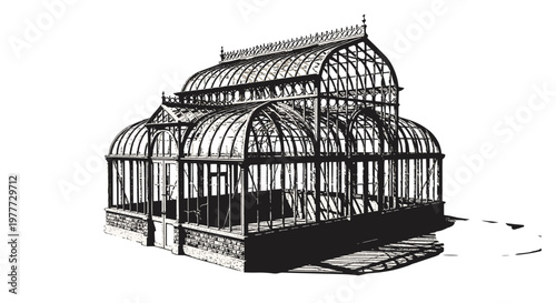 Vintage greenhouse structure with intricate metal framework and glass panels