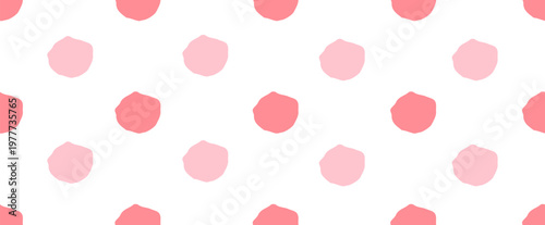 Pink polka dot seamless pattern with soft irregular circles on a white background. Minimal pastel design with a playful hand-drawn feel.