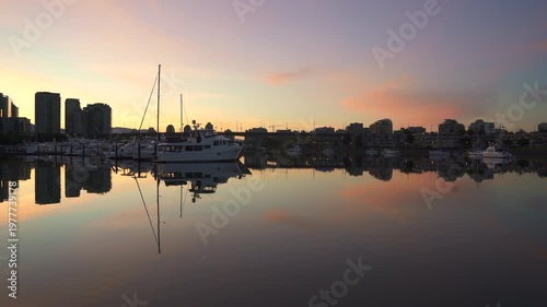 Vancouver Morning Marina and Pink Skyline Reflection 4K UHD. Morning view of the Yaletown skyline on False Creek. Vancouver, British Columbia, Canada. 4K UHD.
