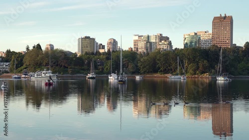 False Creek Sunrise Anchorage 4K UHD. Dawn breaking in a False Creek anchorage. Vancouver, British Columbia, Canada. 4K. UHD.
