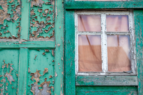 The peeling green door of Time