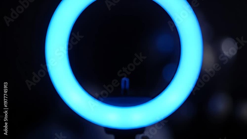 Wallpaper Mural Orange glowing LED ring light on dark background Torontodigital.ca