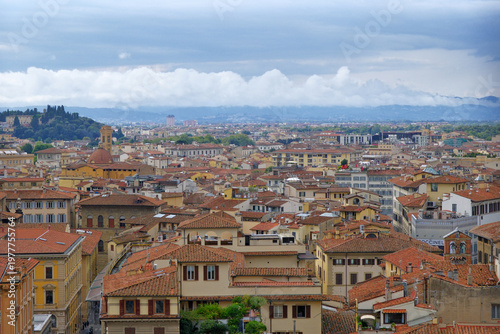 High-angle distant view of historical red-roofed buildings in Florence, Italy