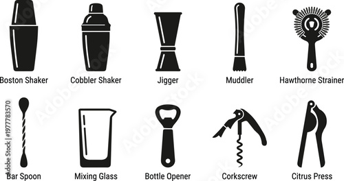 Collection of cocktail making tools and bar essentials for mixology