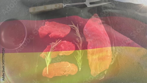 On loop tricolor band drifting, shifting opacity over meats and rosemary, creating German reveal