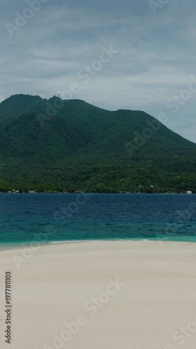 Wallpaper Mural Shoreline of white sand beach with transparent sea waves. White Island. Camiguin. Philippines. Vertical video. Torontodigital.ca