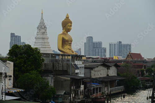 The Phra Phutthathamakaya Thepmongkol at Wat Pak Nam is a Buddha statue in the meditation posture and standing 69 meters tall. It is the tallest Buddha statue in Bangkok. Located in Thailand.