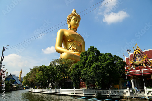 The Phra Phutthathamakaya Thepmongkol at Wat Pak Nam is a Buddha statue in the meditation posture and standing 69 meters tall. It is the tallest Buddha statue in Bangkok. Located in Thailand.