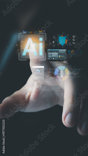 A person's hand touches a glowing virtual Ai icon surrounded by data charts, graphs, and a robot face, illustrating futuristic artificial intelligence technology.