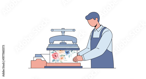 Man operating a printing press with floral design transfer