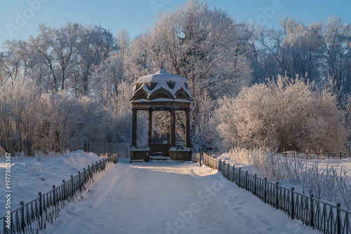 The kivoriy (canopy over the spring of water) in the St. George (Yuriev) on a sunny winter day, Veliky Novgorod, Russia