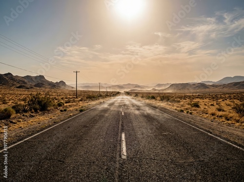 A seemingly endless road cuts through a desolate desert landscape. Under the intense, scorching sun, it stretches towards the horizon, framed by distant mountains and a vast sky.
