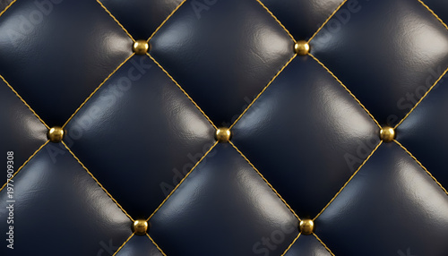 Deep navy blue quilted leather close-up shows diamond stitching and gold buttons. Elegant material forms a luxurious, plush background with rich texture suitable for premium interiors.Luxury Quilted T