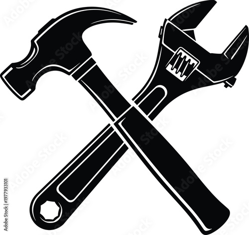 Crossed hammer and adjustable wrench, symbolizing construction or repair work tools.