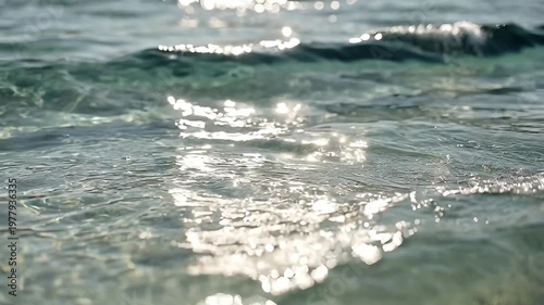 low water level showing gently rolling ocean waves with stunning clarity and transparency