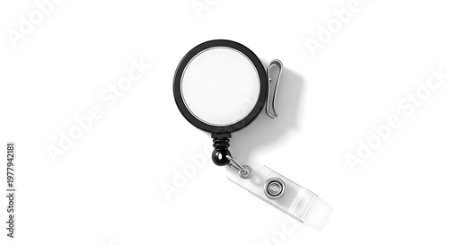 Elegant oval handheld mirror with intricate silver handle on a white surface