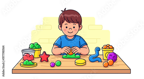 Happy boy playing with colorful modeling clay on a table
