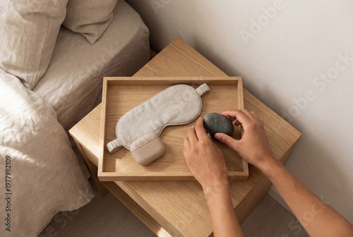 Woman arranging sleep mask