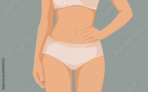 Woman in underwear standing with one hand on her hip indoors