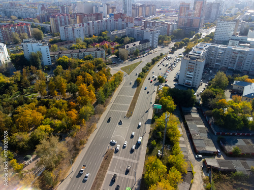 High-angle drone shot (top-down / bird's-eye view) of Profsoyuznaya Street in Tyumen, Russia, captured on September 20, 2022, using a DJI Mini 2. The image shows the central city street with the