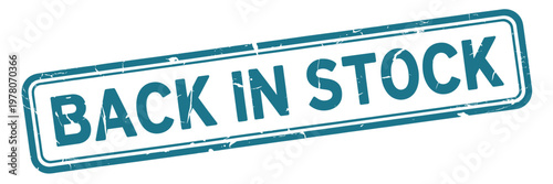 Obraz na plátně A teal rectangular stamp displays the phrase back in stock in bold lettering