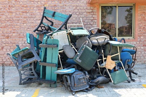 Fotografía Groups of Broken Chairs useless