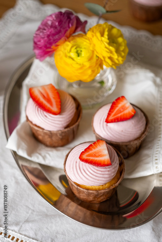 Strawberry Cupcakes with Pink Frosting on a Tray