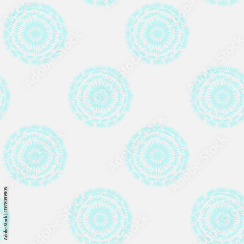 Blue dandelion seed mandala pattern on white background