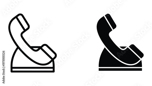 Contrast between an old-fashioned white and black rotary telephone designs