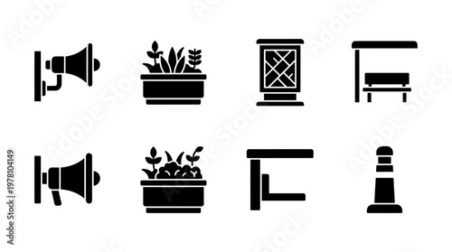 Set of solid icons representing urban infrastructure and public amenities including bus stop, planters, loudspeakers, and bollard for graphic projects.