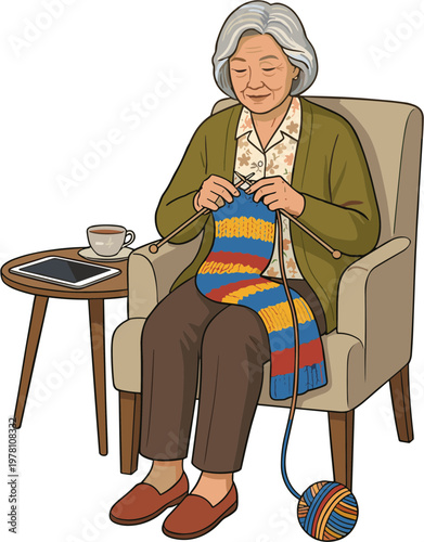 An elderly woman sits in an armchair knitting a colorful blanket with a ball of yarn on the floor.