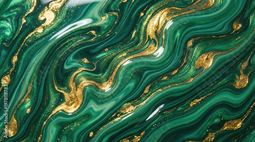Abstract swirling green and gold marble texture with glossy metallic finish
