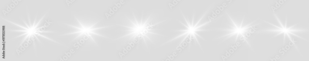 Obraz premium Magic PNG star set flare glows with white radiant beam light. Spark particles drift around soft glowing core gently. Ideal modern festive visuals.