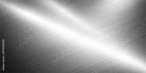 A polished stainless steel plate with a brushed metal texture creates a shiny silver metallic background featuring a smooth industrial aluminum surface and light gray reflections