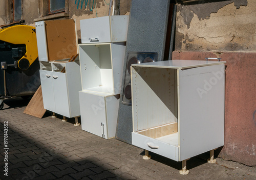 Konstfotografi Bulky waste apartment clearance old kitchen recycling standing on the footpath i
