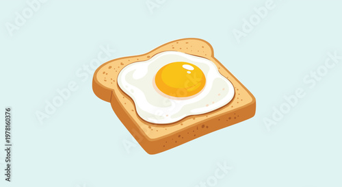 Freshly cooked sunny side up fried egg with a bright yellow yolk rests perfectly on a slice of toasted whole grain wheat bread.