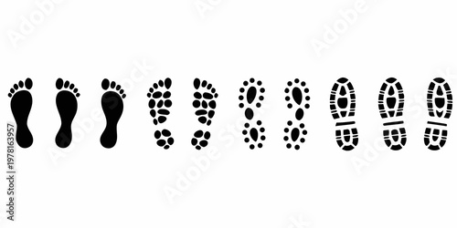 A collection of various black footprints and shoe prints in a row
