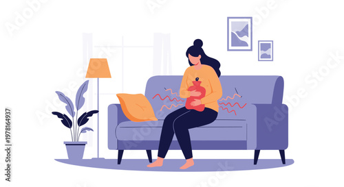 Concerned woman sitting on sofa at home holding hot water bottle to her stomach to relieve menstrual or abdominal pain discomfort.