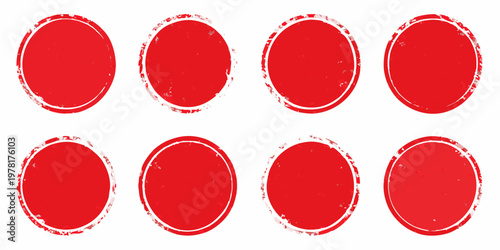 Eight distressed red oval shapes arranged in two rows on white