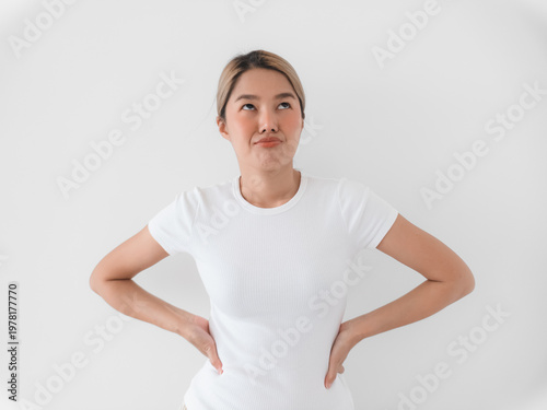 Selfassured Asian woman in white shirt demonstrating leadership confidence