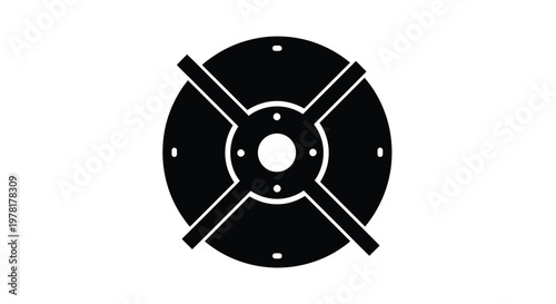 Black circular object with internal details a striking silhouette