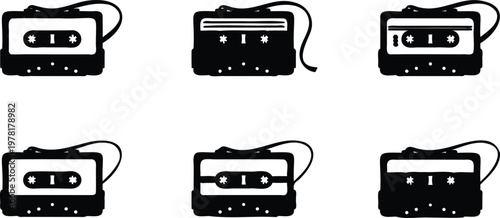Collection of black and white cassette tapes in various orientations on white background  audio music nostalgia