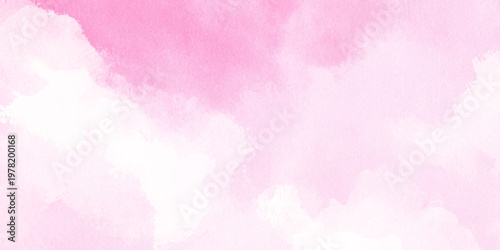 Soft pink watercolor background with white clouds and blended pastel shades for design and artistic projects