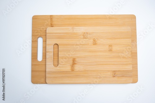 Two Bamboo Cutting Boards with Handles on White